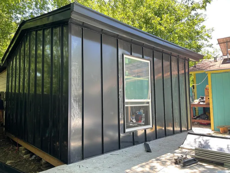 Black standing seam metal wall panels for Metal Roof Installation in Lindsay